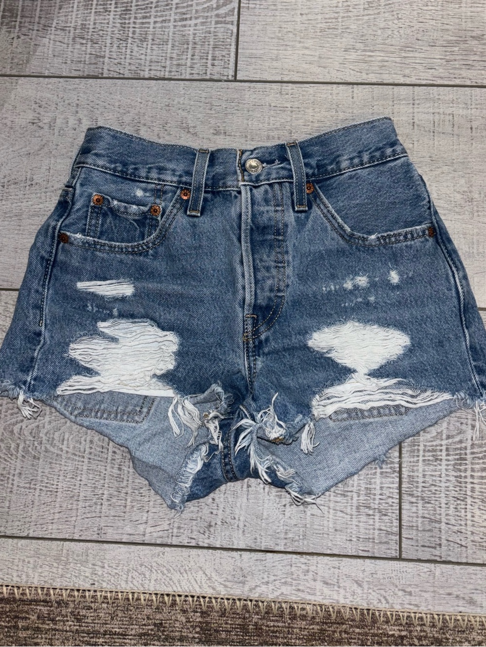 Levi's Distressed Blue High-Rise Jean Shorts
